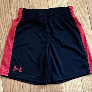 Black Under Armour shorts with red side stripes and UA logo